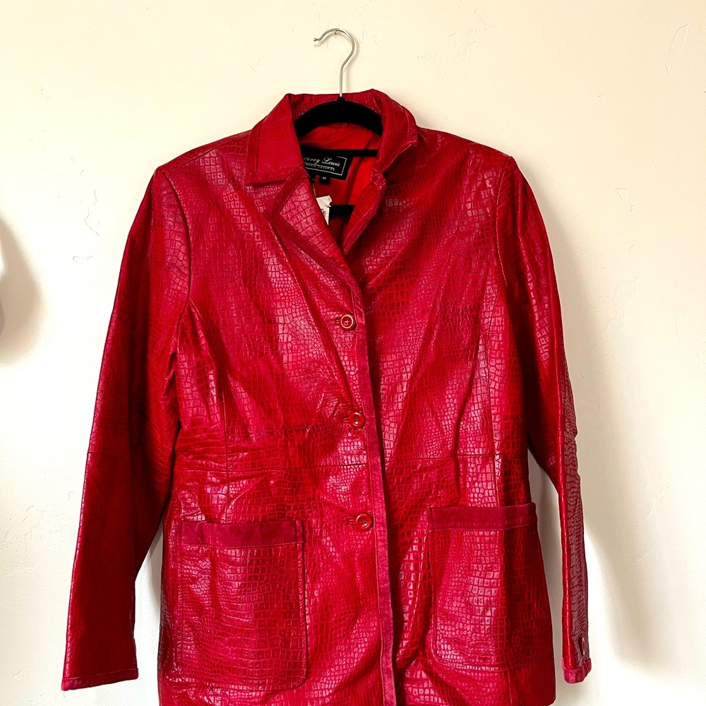 100% red leather jacket light enough for Spring time see tag